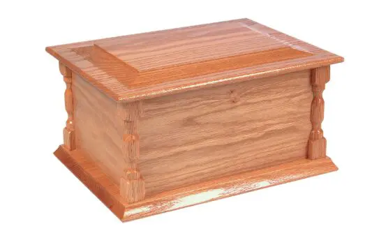 A wooden box with a lid on top of it.